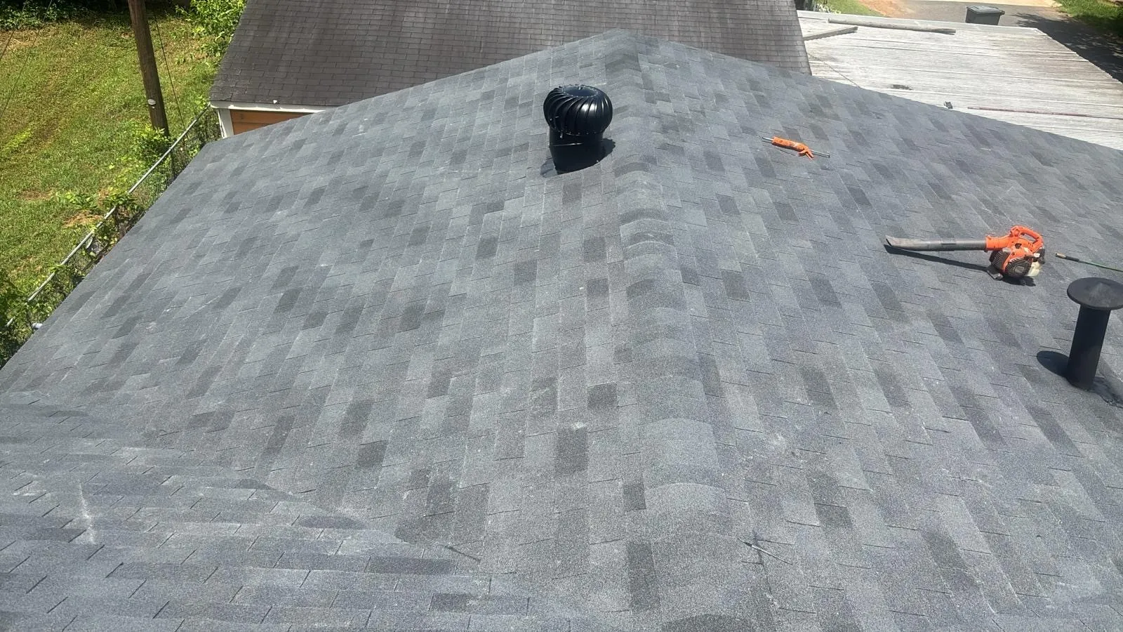 Roof inspection in progress before spring storm season